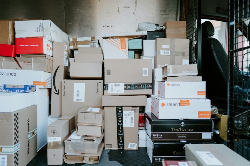 Shipping parcels representing ecommerce website operations, fulfillment and online store costs.